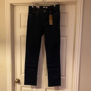 Levi’s Women’s Slimming Slim Dark Blue Jeans Sz 33/32.  NWT